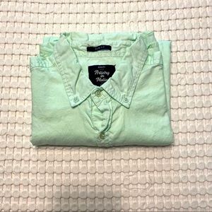 Mint green collared shirt
